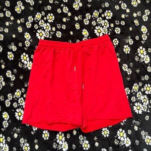 red drawstring track shorts